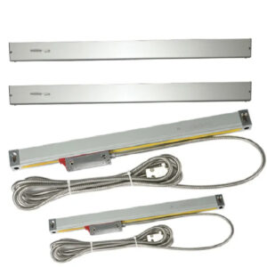 Optical linear encoder scales with readheads and shielded cables used for high-accuracy CNC axis position measurement.