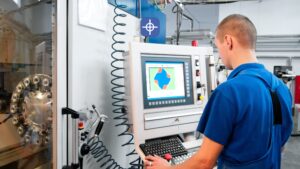 Industrial automation controller operating a CNC machine with a Radonix control interface for 24/7 production